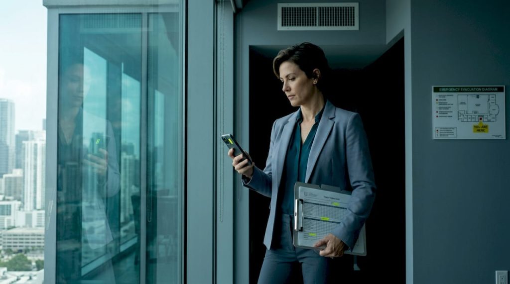 Property manager checks signal strength in office